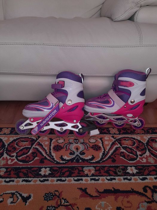 Роликовые коньки