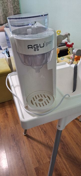 Agu машина за адаптирано мляко