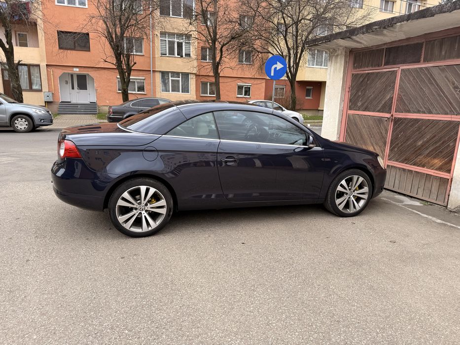 Vw Eos 1.4 benzina 122cp vand sau schimb cu Atv!!