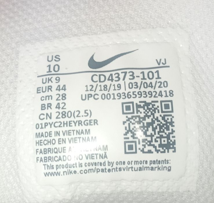 Nike React Vision "Triple White" original.