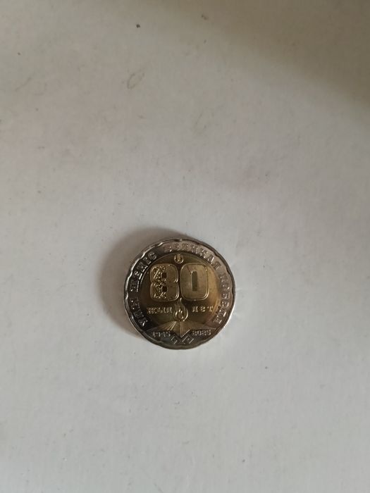 Продам монеты сто двести тенге