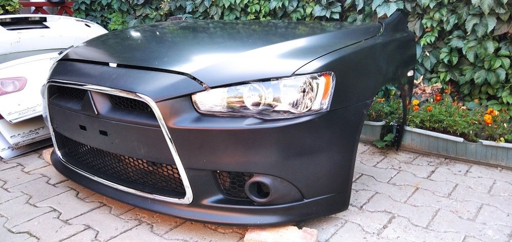 бампер передний лансер 10