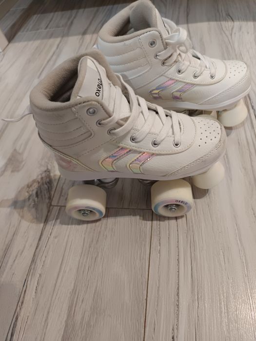 Patine cu rotile/ Role fete Oxelo Quad