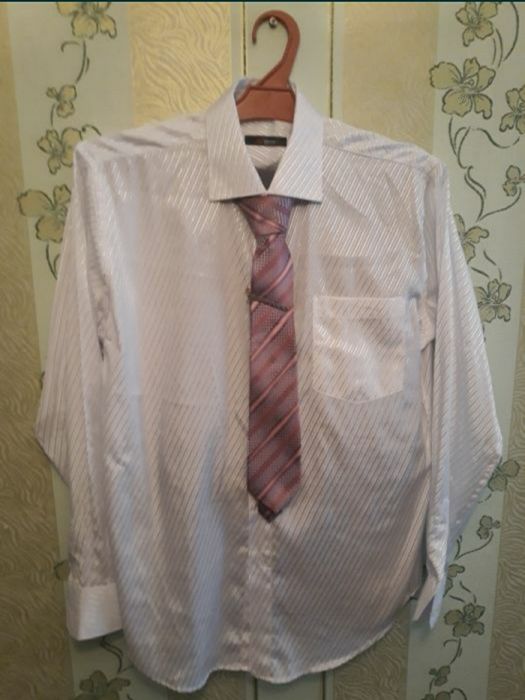 Новый костюм размер 52,