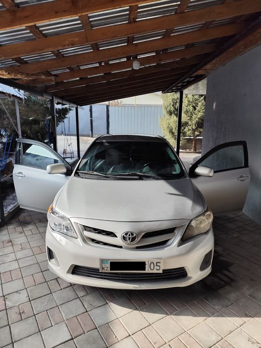 Машина Тайота каролла