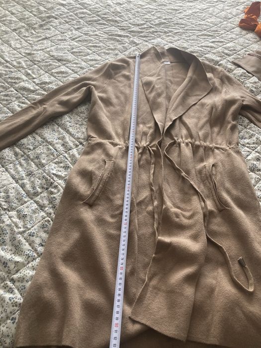 Жилетка, не е носена.