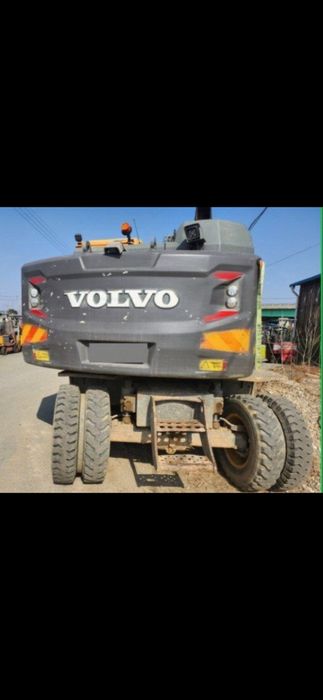 Экскаватор хизмати