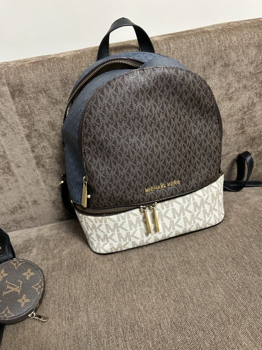 Рюкзаки и сумки в