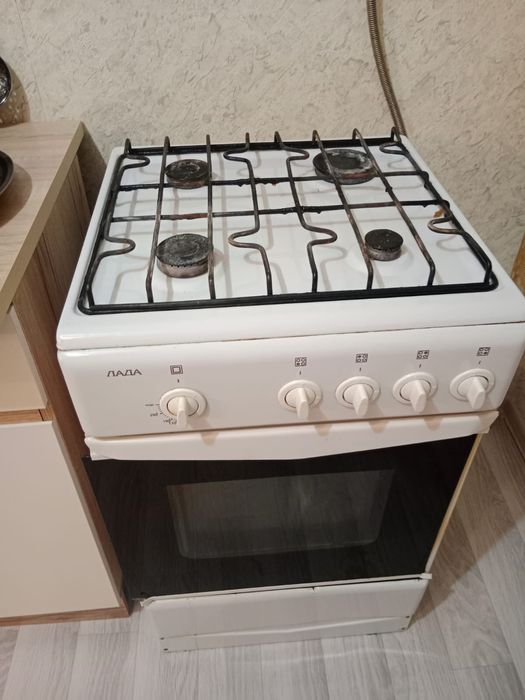 Газ плита четырех камфорная