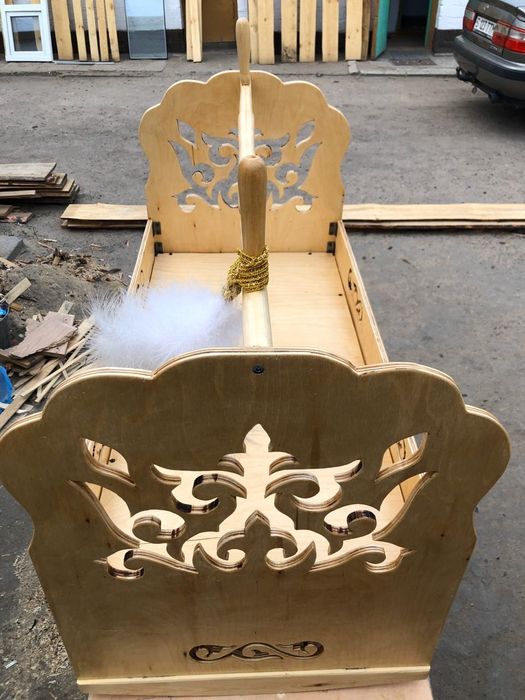 Бесік - колыбель,