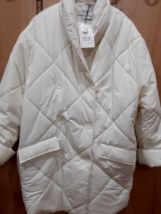 Продам новый женский пуховик50-54р