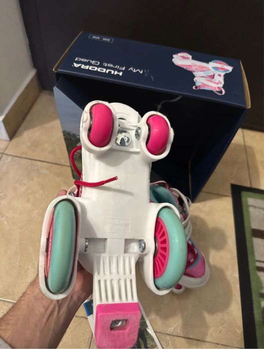 Patine cu rotile mărimi reglabile 26-29 - Roz, stare foarte buna.