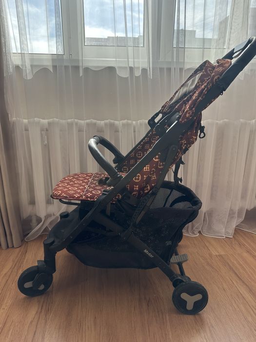 Детская прогулочная коляска