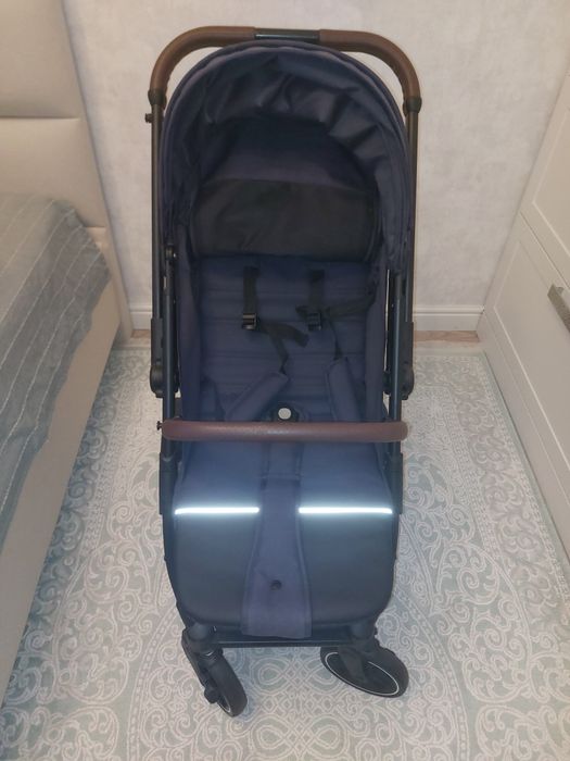 Детская прогулочная коляска