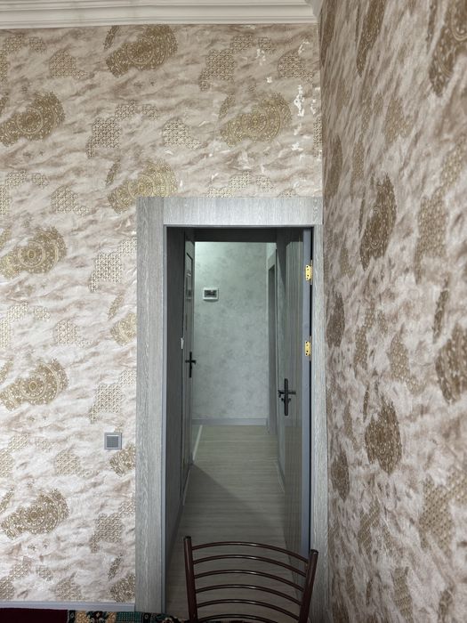 Бирхоналик ва икки хоналик бирта килинган общий площад 107 кв метр