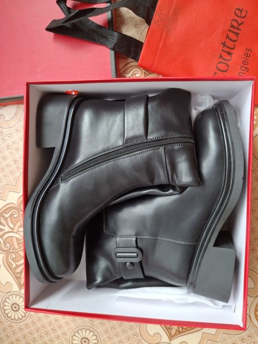 Продам новые сапоги