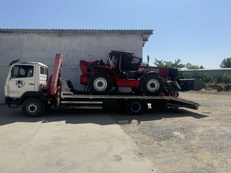 Услуги Манипулятор и Эвакуатора