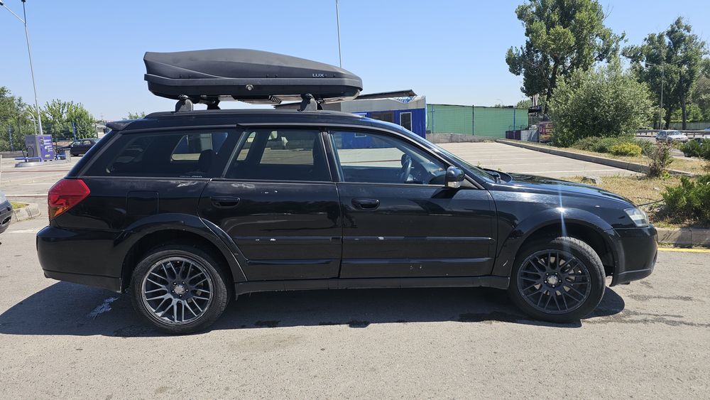 Subaru outback 2005 год 2.5 л