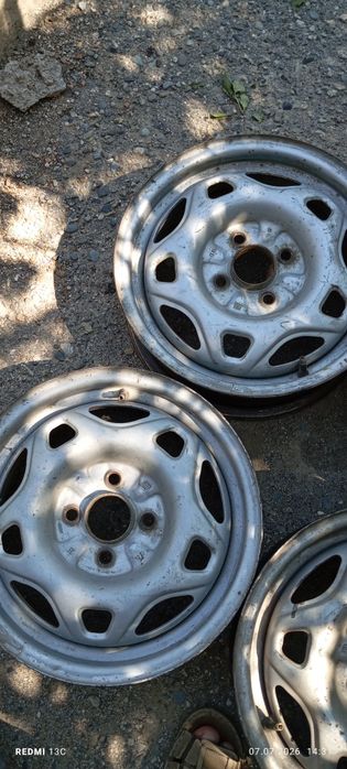 Диски стальные 4/100 R14.Поперечные рейлинги
