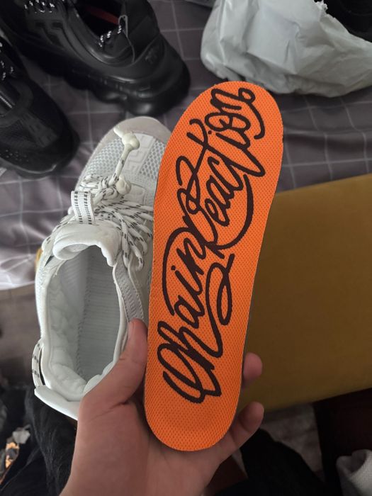 Versace chain reaction