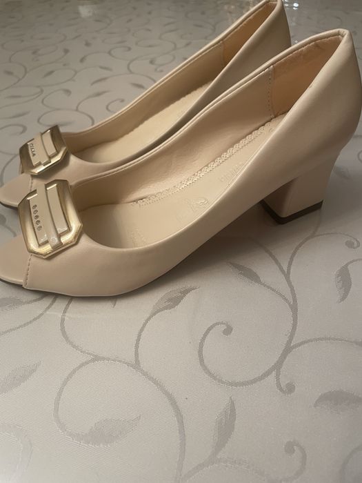 Продам новые туфли