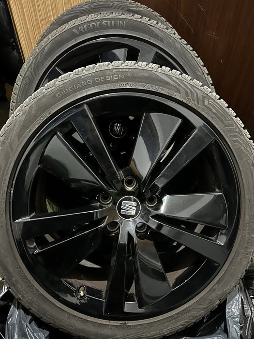 Джанти с всесезонни гуми Сеат 18 5 112