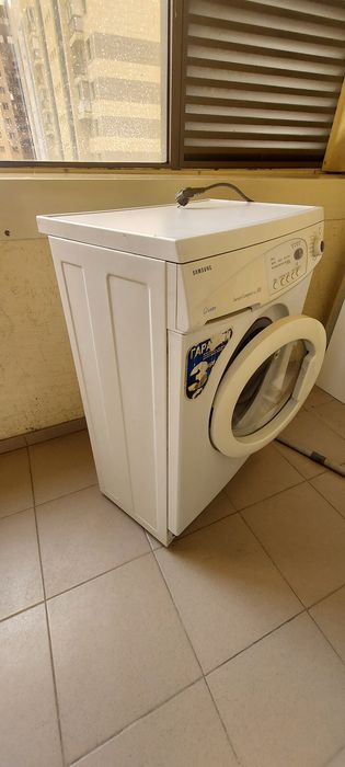 Стиральная машина в рабочем состоянии