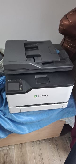 Imprimantă multifuncțională laser