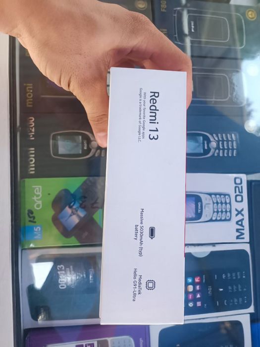 Redmi 13 yangi 1 kun ishlatilgan 1,700000 som kelishamiz  xotira 6/128