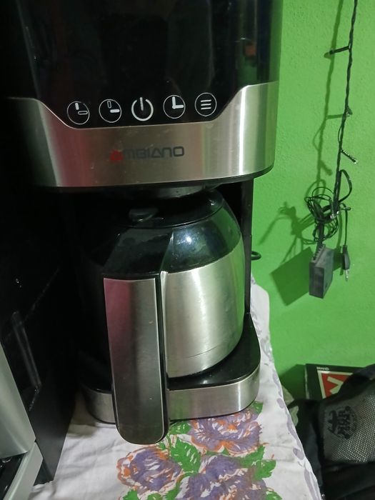 Aparate de cafea cu cafea boabe cu cafea macinata si capsule