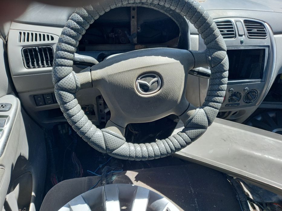 Компютер на мазда премаси  2002 год