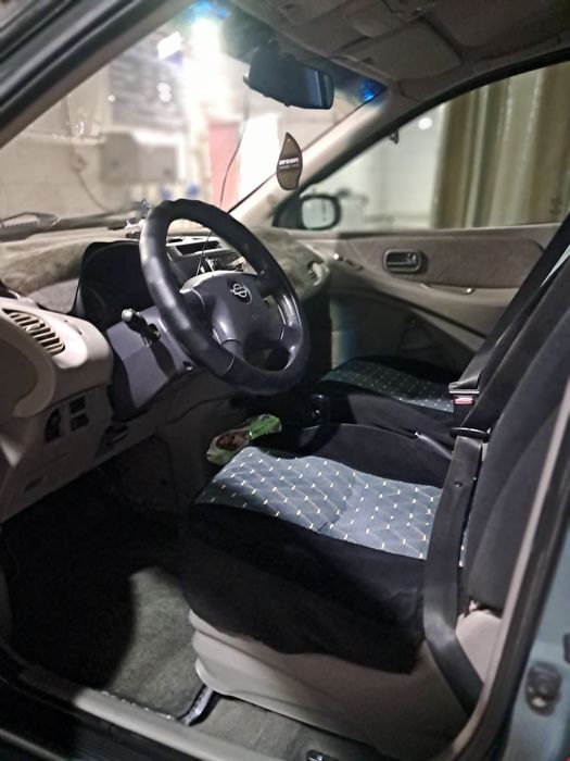 Ниссан Альмеро Тино.