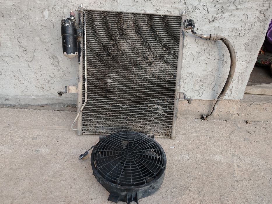 Радиатор кондиционера L200.