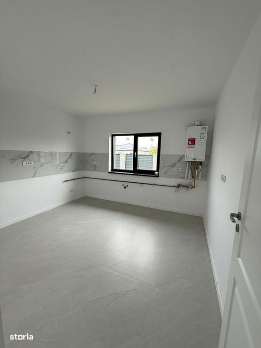 Casa pe parter cu 4 camere , incalzire in pardoseala , teren 400 mp