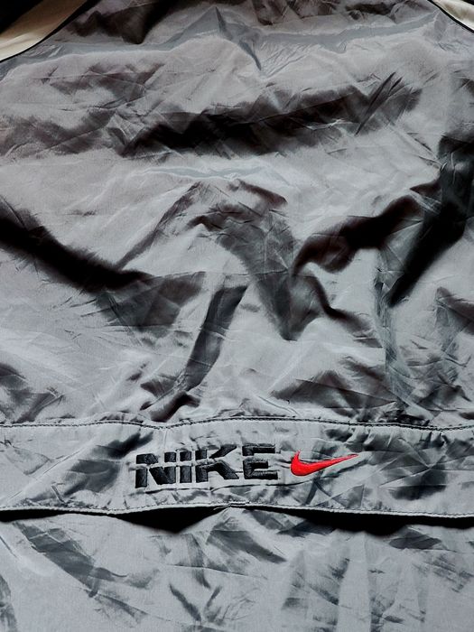 Jacheta Nike wind.