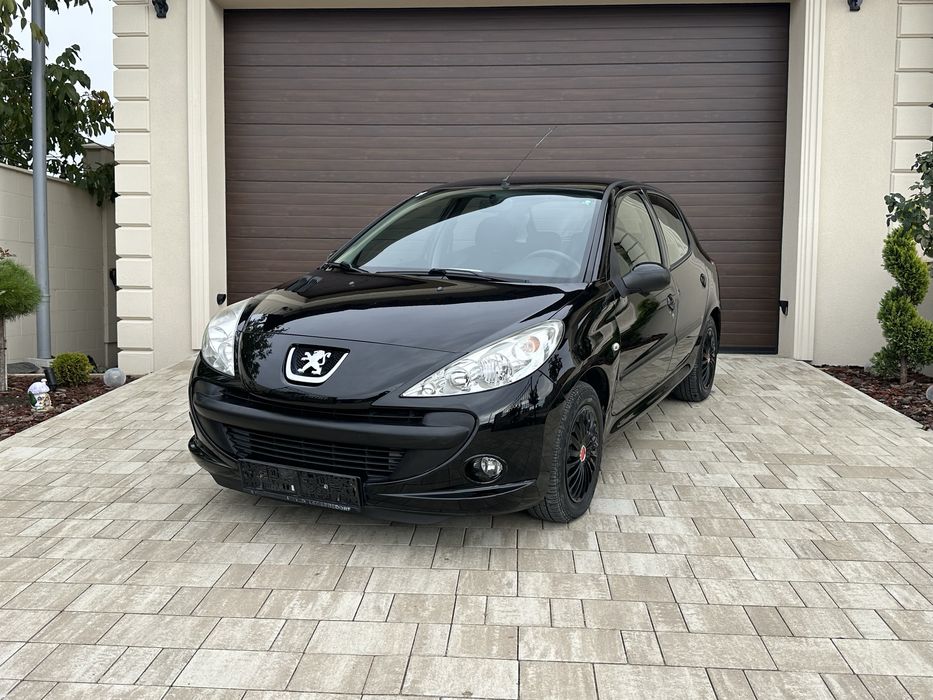 PEUGEOT 206 2011 — imagine 1