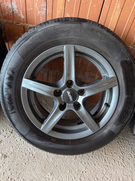 Set 4 jante aliaj Alutec 15" + anvelope vară Yokohama BluEarth 195/65 R15