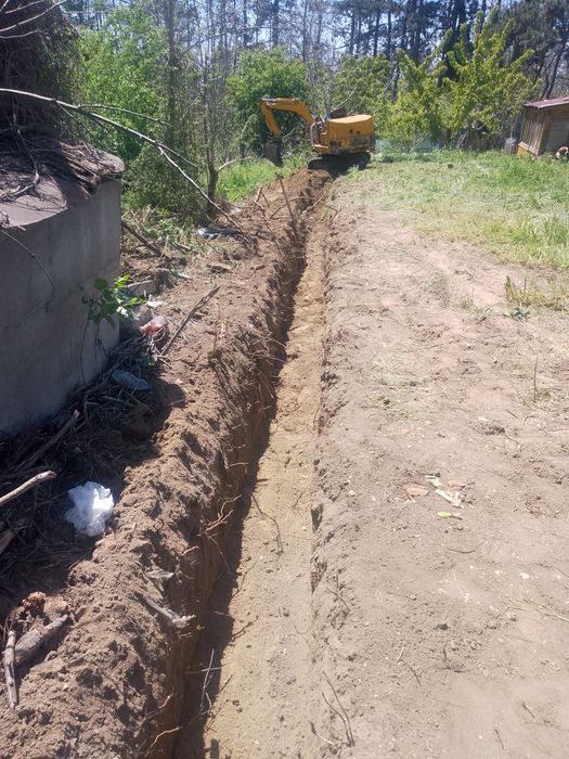 Услуги с малък багер