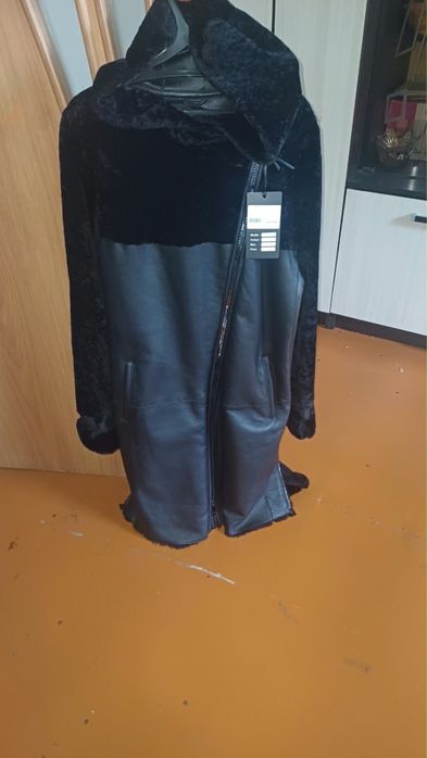 Продам шубу в отличном состояние