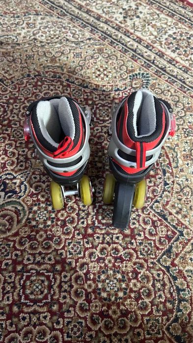 Продам ролики длина стопы регулируется