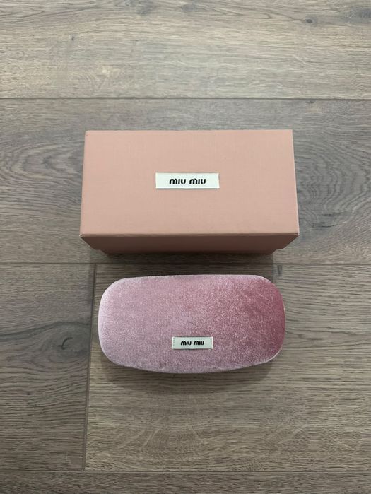 Нови Miu Miu Regard tortoiseshell-effect sunglasses