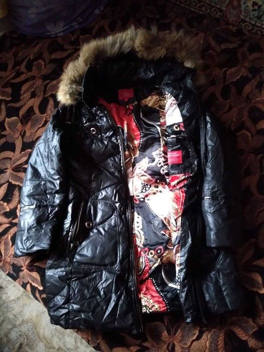 Зимние куртки и пуховики