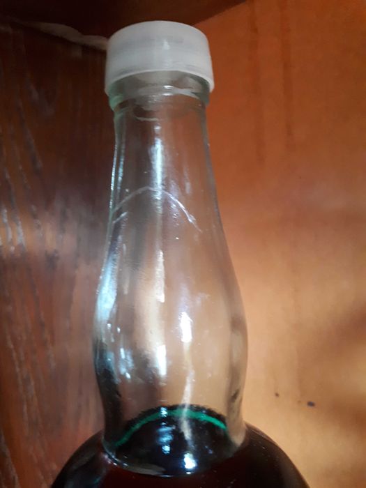 CONIAC OVIDIU,  HUSI 40%vol. 1 L,    îmbuteliat în anii 1975-1980