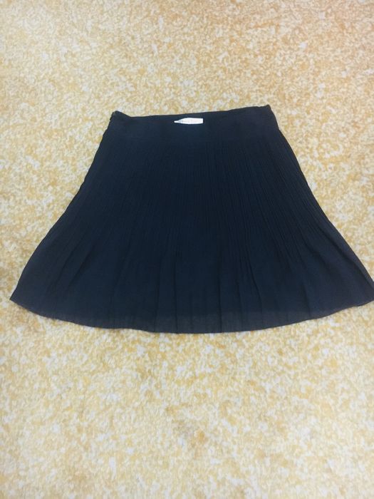 Фирменная юбка для большего тенниса с боковыми молниями