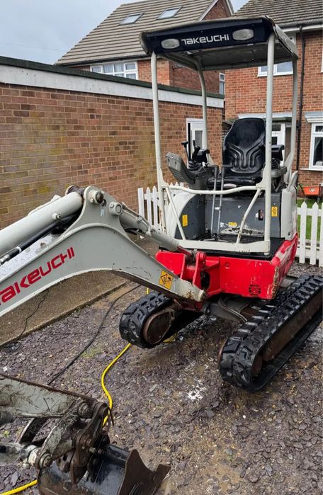 Мини багер Takeuchi