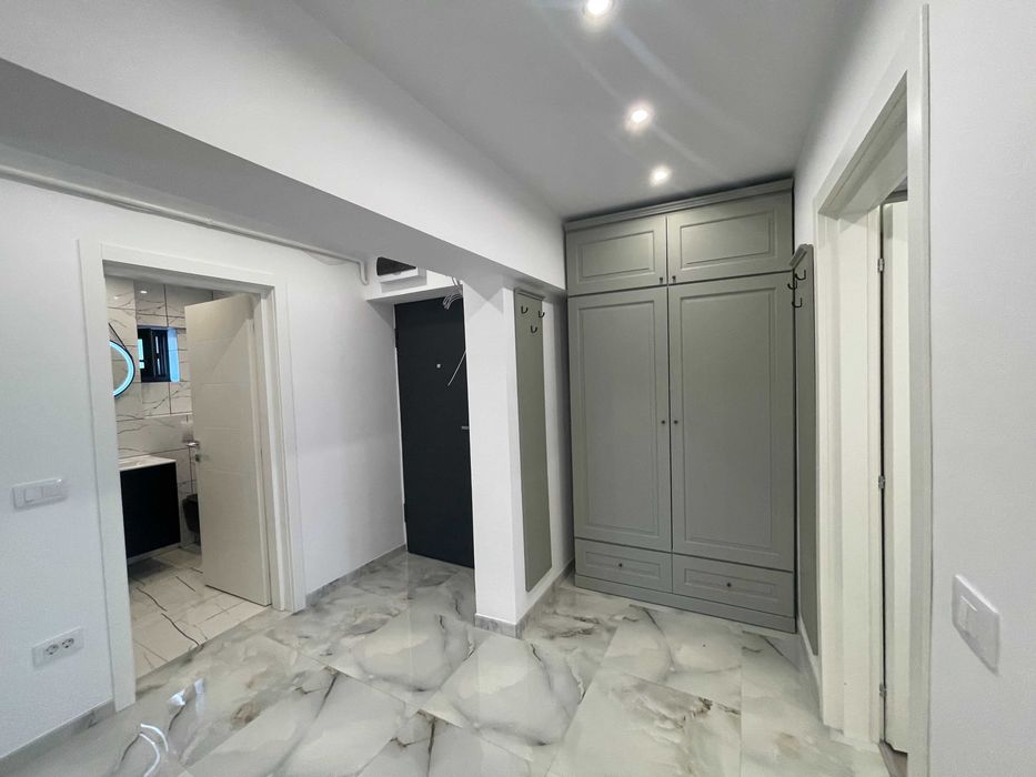 PRIMA ÎNCHIRIERE | Apartament premium cu 2 dormitoare |Zona McDonald's-Centru/Posibilitate parcare auto