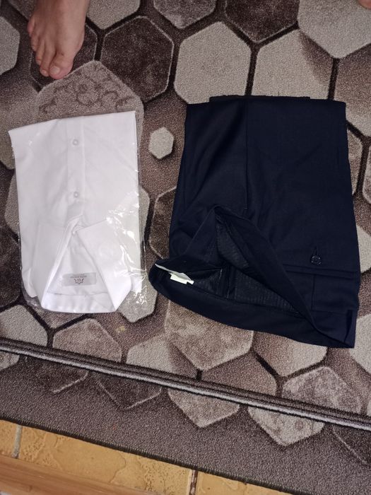 Продам школьные рубашки и брюки