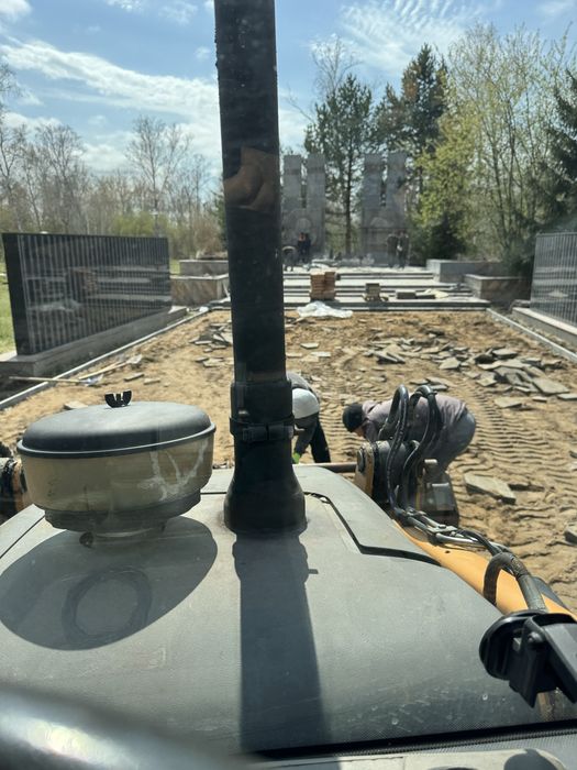 Услуги Эксковатор-погрузчик