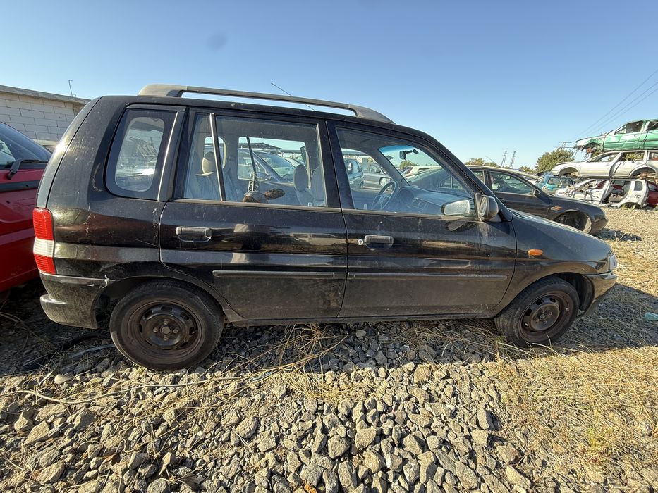 Мазда Демио 1.3 75к.с. на части