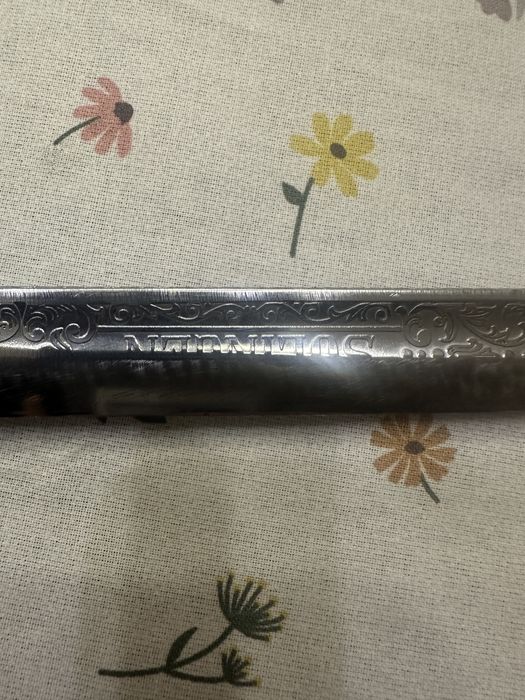 Cutit realizat din sabie de ofiter al regelui Ferdinand